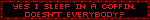 A black and red blinkie that says 'Yes I sleep in a coffin. Doesn't everyone?'